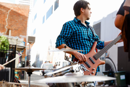 A street musician playing his guitar