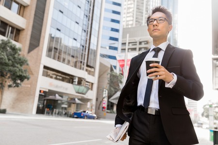 Businessman outdoors in city business districtの写真素材