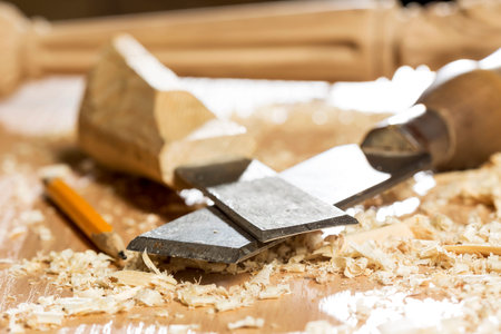 Cutters for wood and wood shavings on table