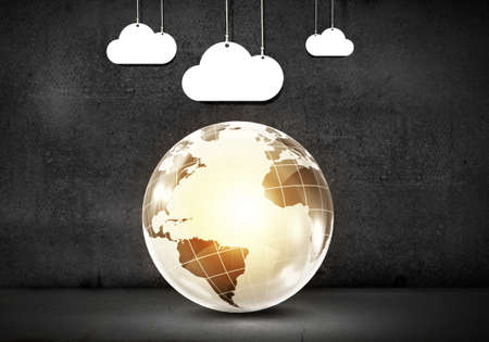 Computing concept with Earth planet and cloudの写真素材