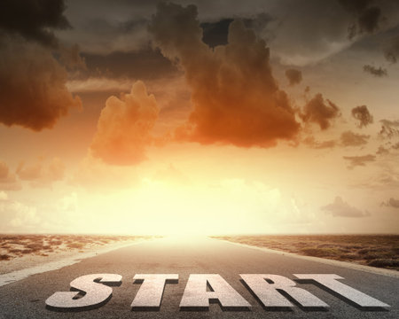 Start word on asphalt road and sunrise at horison line