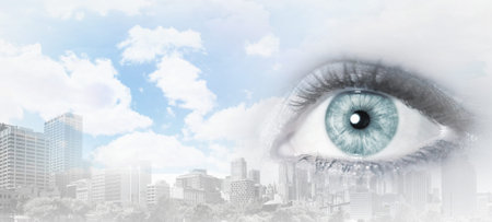 Bird eye view of modern city with human female eyeの写真素材