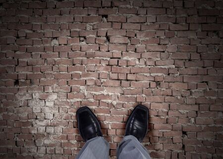 Top view of businessman legs choosing his wayの写真素材