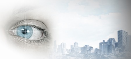 Bird eye view of modern city with human female eyeの写真素材