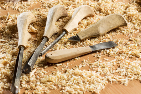 Cutters for wood and wood shavings on table