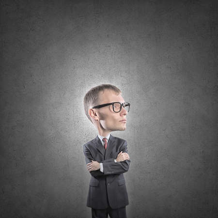 Young funny man in glasses with big headの写真素材