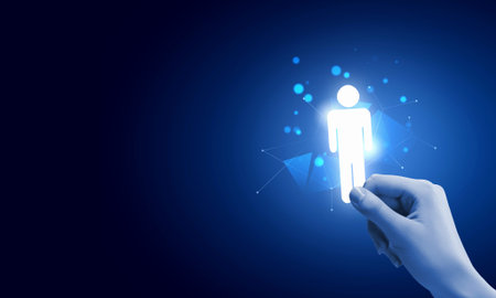 Close up of hand holding male digital figure