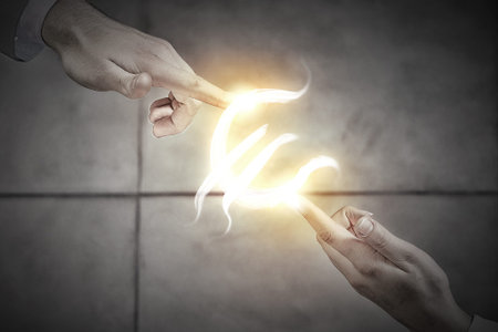 Top view of two businesswpeople reaching fingers to touch each other