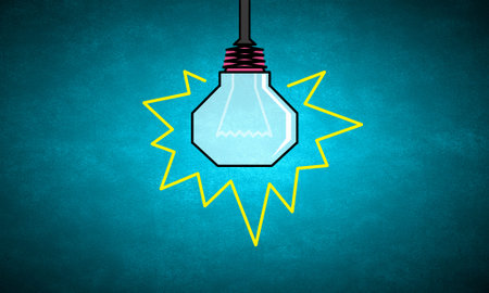 Illuminating hanging light bulb on dark background