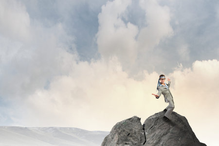 Cheerful young businessman with tie around headの写真素材