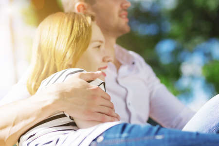 Young couple in love having fun and enjoying the beautiful natureの写真素材