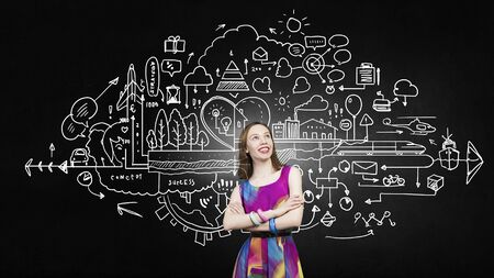 Woman in multicolored dress against sketch backgroundの写真素材