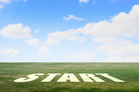 Start word as motivation writen on green grassの写真素材