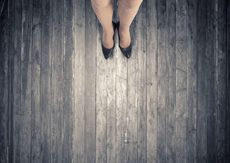 Top view of businesswoman legs in elegant shoesの写真素材