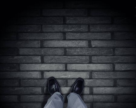 Top view of businessman legs choosing his wayの写真素材