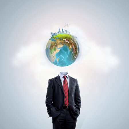 Business man with globe for head. Elements of this image are furnished by NASAの写真素材