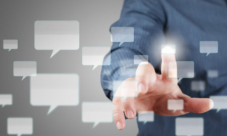 Close up of businessman hand touching icon on screen