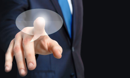 Close up of businessman hand touching icon on screen