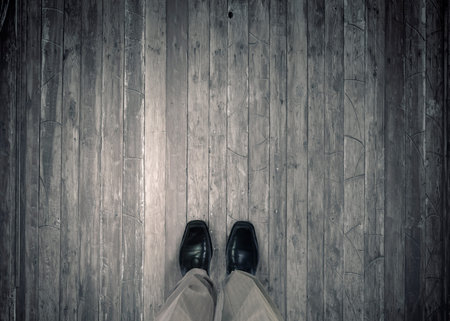 Top view of businessman legs choosing his way