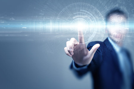 Close up of businessman touching virtual panel with finger