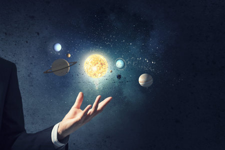 Close up of planet sun system in your hand