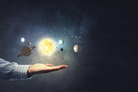 Close up of planet sun system in your hand