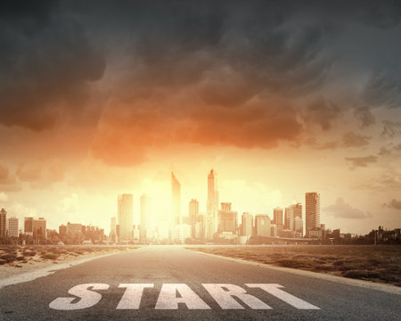 Conceptual image with word start on asphalt road