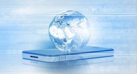 Mobile internet concept with mobile phone and digital planet.  の写真素材