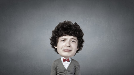 Young funny man in glasses with big headの写真素材