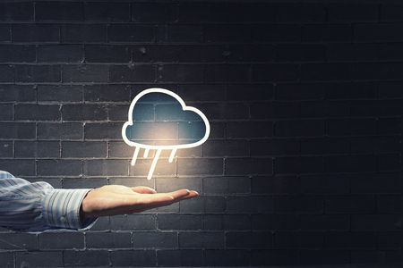 Close up of male hand showing cloud computing conceptの写真素材