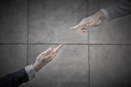Top view of a businessman and woman shaking hands in office lobbyの写真素材