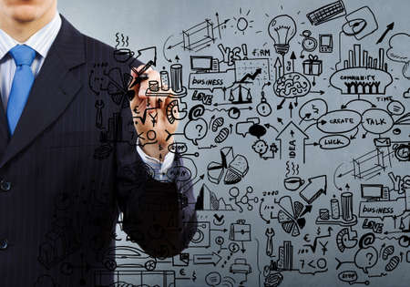 Close up of man hand drawing success strategy planの写真素材