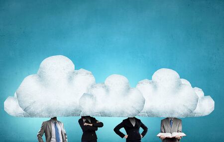 Unrecognizable businesspeople with cloud instead of headの写真素材