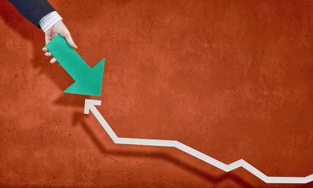 Hand holding arrow representing business growth concept