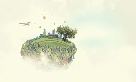 City construction model with cogwheel mechanism on sky backgroundの写真素材