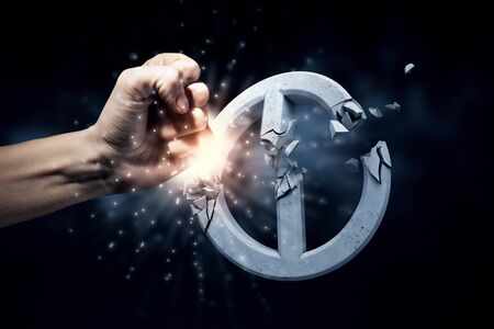 Close up of human hand touching prohibition signの写真素材