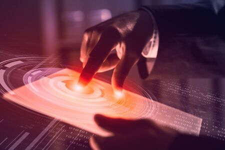 Businessman pressing modern technology panel with finger print readerの写真素材
