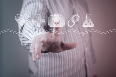 Hand of businessman pressing icon on virtual screen