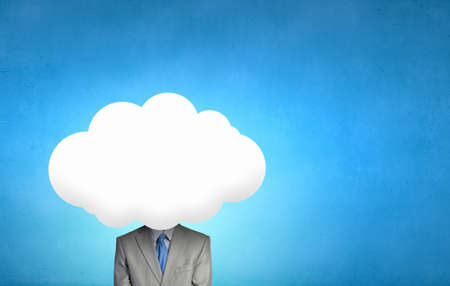 Young businessman with cloud instead of headの写真素材