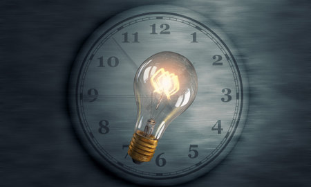 Conceptual image with light bulb and clock on dark background