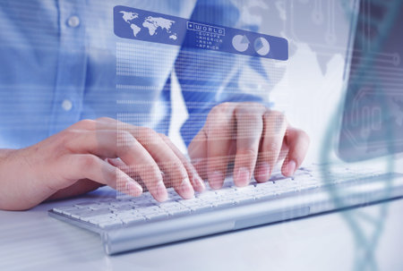 Hands of businessman working with keyboard and mouse