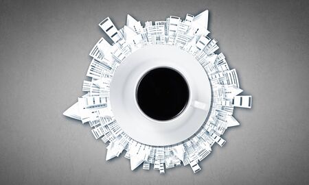 Conceptual image of cup of coffee and modern city conceptの写真素材