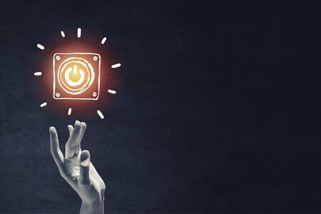 Power button hand drawn with chalk on blackboard backgroundの写真素材