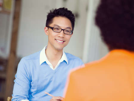 Young candidate having an interview with his employer