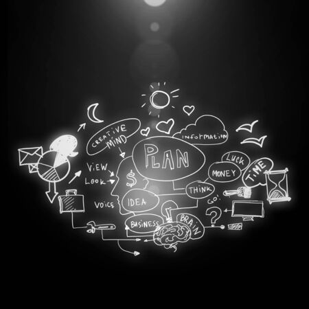 Male hand pointing with finger at business plan on screenの写真素材