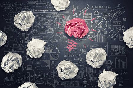 Inspiration concept with crumpled paper as sign for creativity work