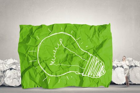 Inspiration concept with crumpled paper as sign for creativity workの写真素材