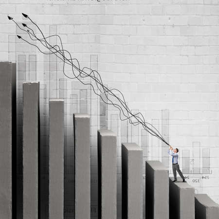 Cheerful businessman playing pipe and financial growth conceptの写真素材