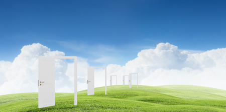 Conceptual image with opened doors as new way entrance to new worldの写真素材