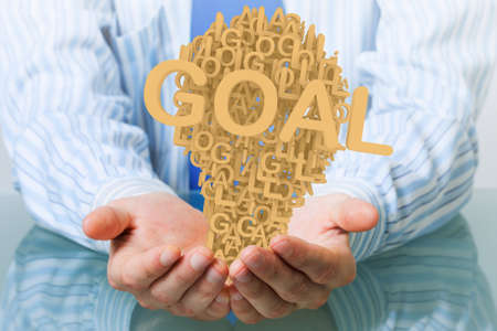 Hands of businessman holding with care idea conceptの写真素材